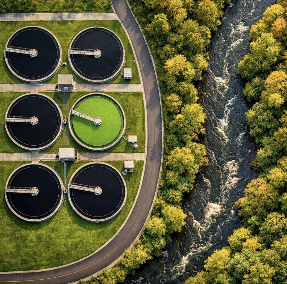 Modern wastewater treatment facility handling complex influent chemistry from industrial and municipal sources