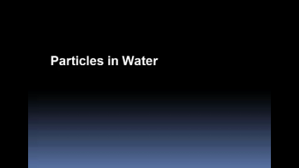 Animated rendering of a CANTY InFlow dynamic imaging analyzer measuring particles in a Water for Injection stream with a magnified view of particle images.