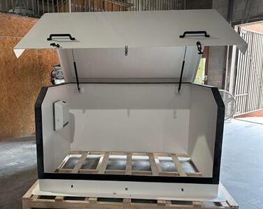 A gemeni 5 large size fiberglass enclosure with gas spring lifts supporting the enclosure hood
