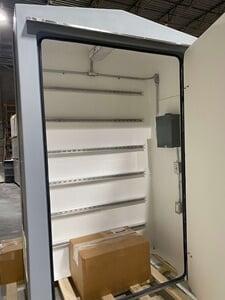 Shelter with wall struts to mount equipment and instrumentation