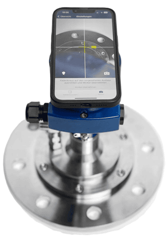 Mobile phone displaying alignment interface for a Bluetooth-connected radar level transmitter, showing crosshair setup for calibration.