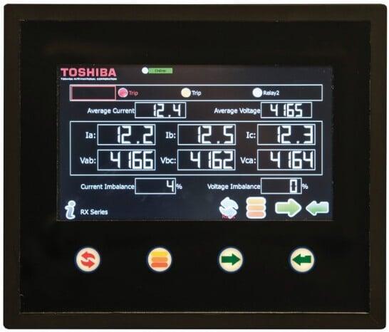 Toshiba HMI touch screen displaying current, voltage, trip status, and system imbalance data for industrial equipment monitoring.